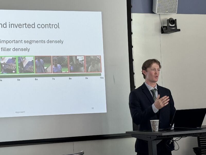 Cameron presenting a slide on keeping important segments versus filler